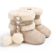 Bottes d'hiver pour bébé : des boules de poils chaudes et élégantes