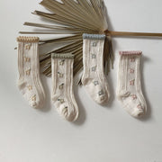 Chaussettes à volants et motif floral pour enfants