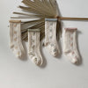 Chaussettes à volants et motif floral pour enfants